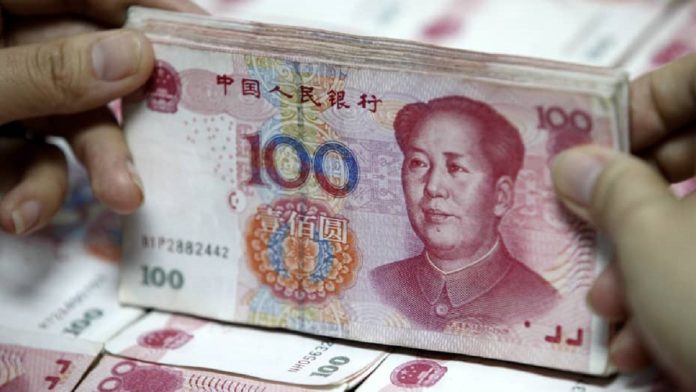 Chinese Yuan Weakens to 7.1063 Against U.S. Dollar